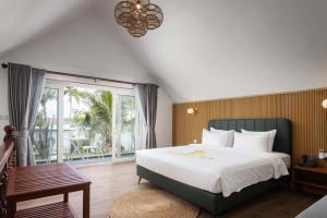 Postel nebo postele na pokoji v ubytování Koh Apikjun Resort by EHM + 94 fotografií