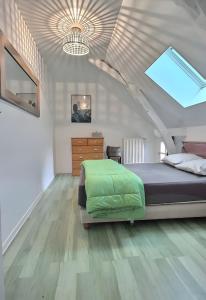 Postel nebo postele na pokoji v ubytování Le Clos Fleuri