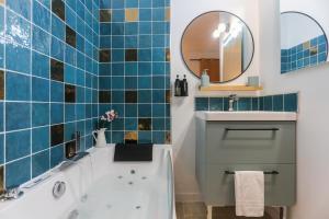 Vannituba majutusasutuses Appart Ciné Spa Amiens Cathédrale Parking Beffroi