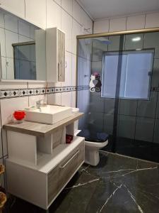 O baie la Apartamento completo +4 fotografii