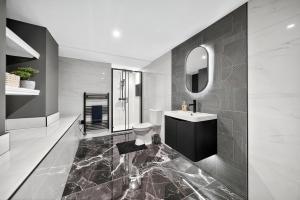 Koupelna v ubytování Rosemont ApartHotel