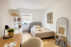 Postel nebo postele na pokoji v ubytování Business Apartment nähe Hauptbahnhof