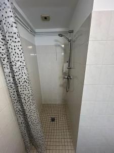 Un baño de Hotel ARC EN CIEL