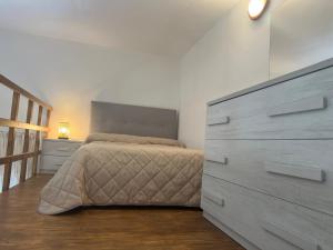 Ένα ή περισσότερα κρεβάτια σε δωμάτιο στο casa serena