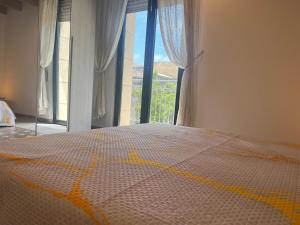 Ένα ή περισσότερα κρεβάτια σε δωμάτιο στο casa serena +3 φωτογραφίες