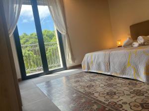 Ένα ή περισσότερα κρεβάτια σε δωμάτιο στο casa serena