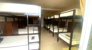 Φωτογραφία από το άλμπουμ του Capital O 91246 Tokman Inn σε Pantai Cenang