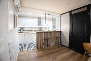 Η κουζίνα ή μικρή κουζίνα στο Office Habitación de lujo para 2 personas