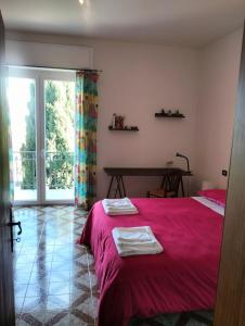 Ένα ή περισσότερα κρεβάτια σε δωμάτιο στο Da Jack Rooms, la tua casa vacanze!