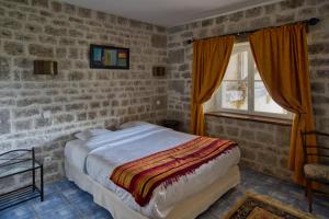 Postel nebo postele na pokoji v ubytování Domaine des Chais