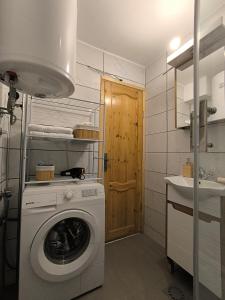 Η κουζίνα ή μικρή κουζίνα στο Apartman Gorska priča, Mokra Gora