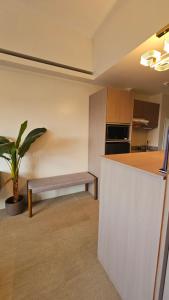 Kuchyň nebo kuchyňský kout v ubytování Cozy Stay near IT Park, pool, netflix, fast wifi, gym