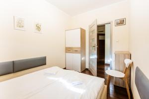 Postel nebo postele na pokoji v ubytování Parkowa Polana, Sun & Snow