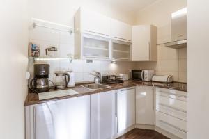 Kuchyň nebo kuchyňský kout v ubytování Parkowa Polana, Sun & Snow