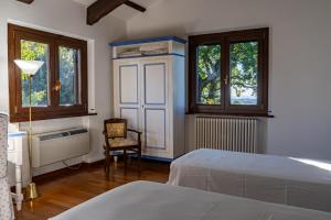 En eller flere senge i et værelse på Residenza Lovely + 44 billeder