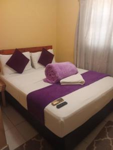 Postel nebo postele na pokoji v ubytování Salvie Geust Inn