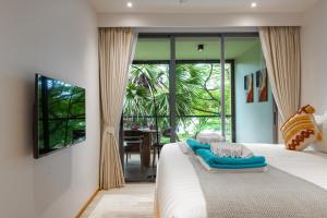 Ένα ή περισσότερα κρεβάτια σε δωμάτιο στο Beachside Residences 3 BR apartment by NLA +53 φωτογραφίες