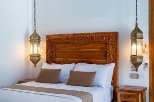 Ένα ή περισσότερα κρεβάτια σε δωμάτιο στο Halisi Villas