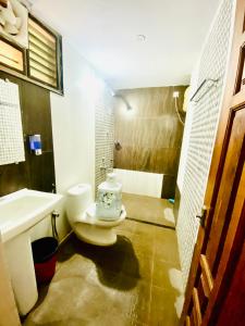 Vannituba majutusasutuses AL-MANAL 304 premium Room 5Beds