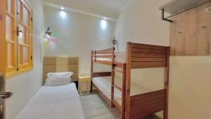 Giường trong phòng chung tại Cycas family apart ground floor parking
