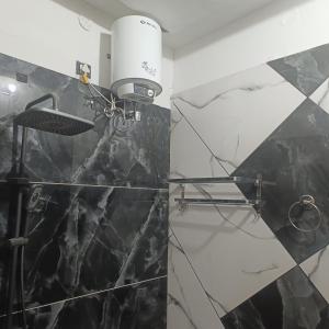 Koupelna v ubytování Naam Residency