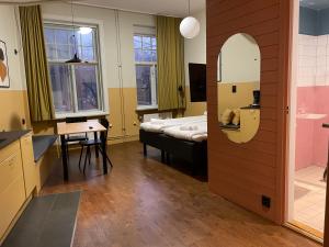 Una cama o camas en una habitación de Forenom Aparthotel Malmö Varvsstaden