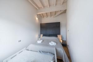 Кровать или кровати в номере Casa Saskie