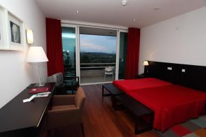 Uma cama ou camas num quarto em INATEL Vila Ruiva
