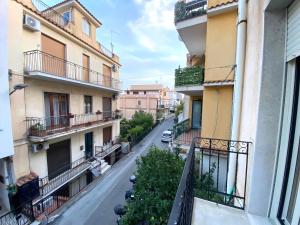 a view of a street from an apartment building at A casa di Adele in Taormina