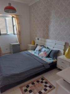 Ένα ή περισσότερα κρεβάτια σε δωμάτιο στο Apartment for work or vacation stays