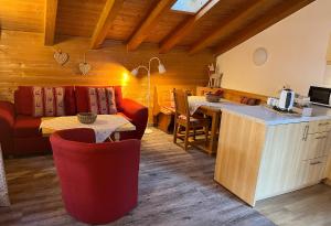 Μια τηλεόραση ή/και κέντρο ψυχαγωγίας στο Ferienwohnungen Haid