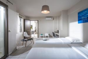 Ένα ή περισσότερα κρεβάτια σε δωμάτιο στο Bianca Doma Adults Only by Estia +17 φωτογραφίες