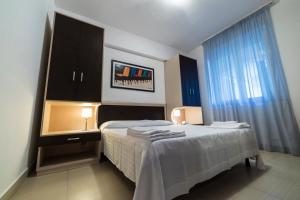 Postel nebo postele na pokoji v ubytování Sirina House Taormina