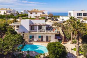 Swimmingpoolen hos eller tæt på Duas Palmeiras