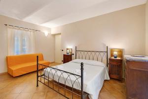 Ένα ή περισσότερα κρεβάτια σε δωμάτιο στο Cascina Orlandi +127 φωτογραφίες