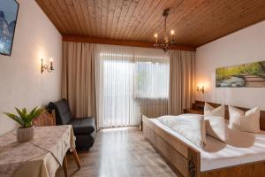 Una cama o camas en una habitación de Landhaus zum Griena