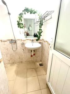 a bathroom with a sink and a mirror at CHILLING SUDIO 11 Trinh Cong Son close Ho Tay vs Lotte mail ! in Hanoi +70 photos