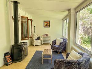 Et opholdsområde på Arkelshoek Cottages