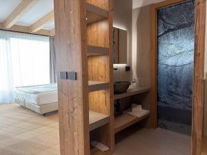 Postel nebo postele na pokoji v ubytování Liz Hotel & Apartments