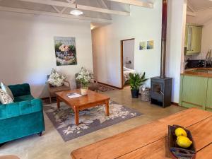 Et opholdsområde på Arkelshoek Cottages + 58 billeder