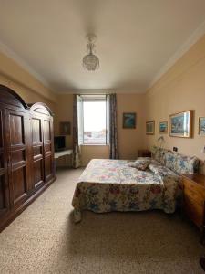 Ένα ή περισσότερα κρεβάτια σε δωμάτιο στο B&b la stufa