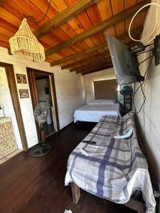 Ένα ή περισσότερα κρεβάτια σε δωμάτιο στο Cabaña Gero