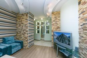 Μια τηλεόραση ή/και κέντρο ψυχαγωγίας στο One bedroom, Luxury, 13 Khreshchatyk str, Maidan
