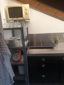 Kuchyň nebo kuchyňský kout v ubytování Apartamento tilos + 3 fotografie