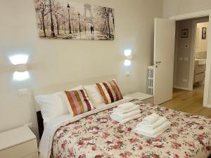 Ένα ή περισσότερα κρεβάτια σε δωμάτιο στο Appartamento Elena