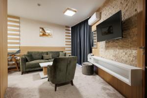 TV a/nebo společenská místnost v ubytování Hotel Casa Karina Bansko - Half Board & All Inclusive