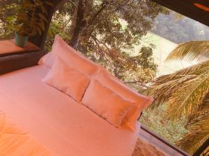 Postel nebo postele na pokoji v ubytování Kay’s Den Kandy