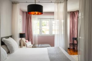 Ένα ή περισσότερα κρεβάτια σε δωμάτιο στο BYPILLOW Villa Lorena Adults Recommended +52 φωτογραφίες