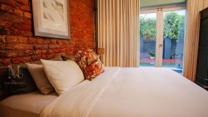 En eller flere senge i et værelse på The Molteno + 23 billeder