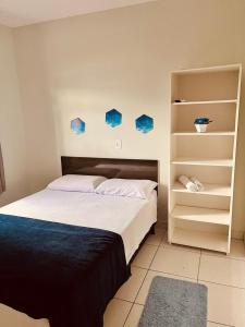 Ένα ή περισσότερα κρεβάτια σε δωμάτιο στο Hotel Pousada Pereira +37 φωτογραφίες